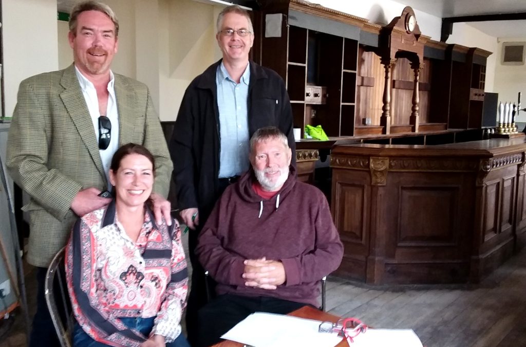 New tenants signing the lease to run the Chequer Inn for the community of Ash and surrounding areas